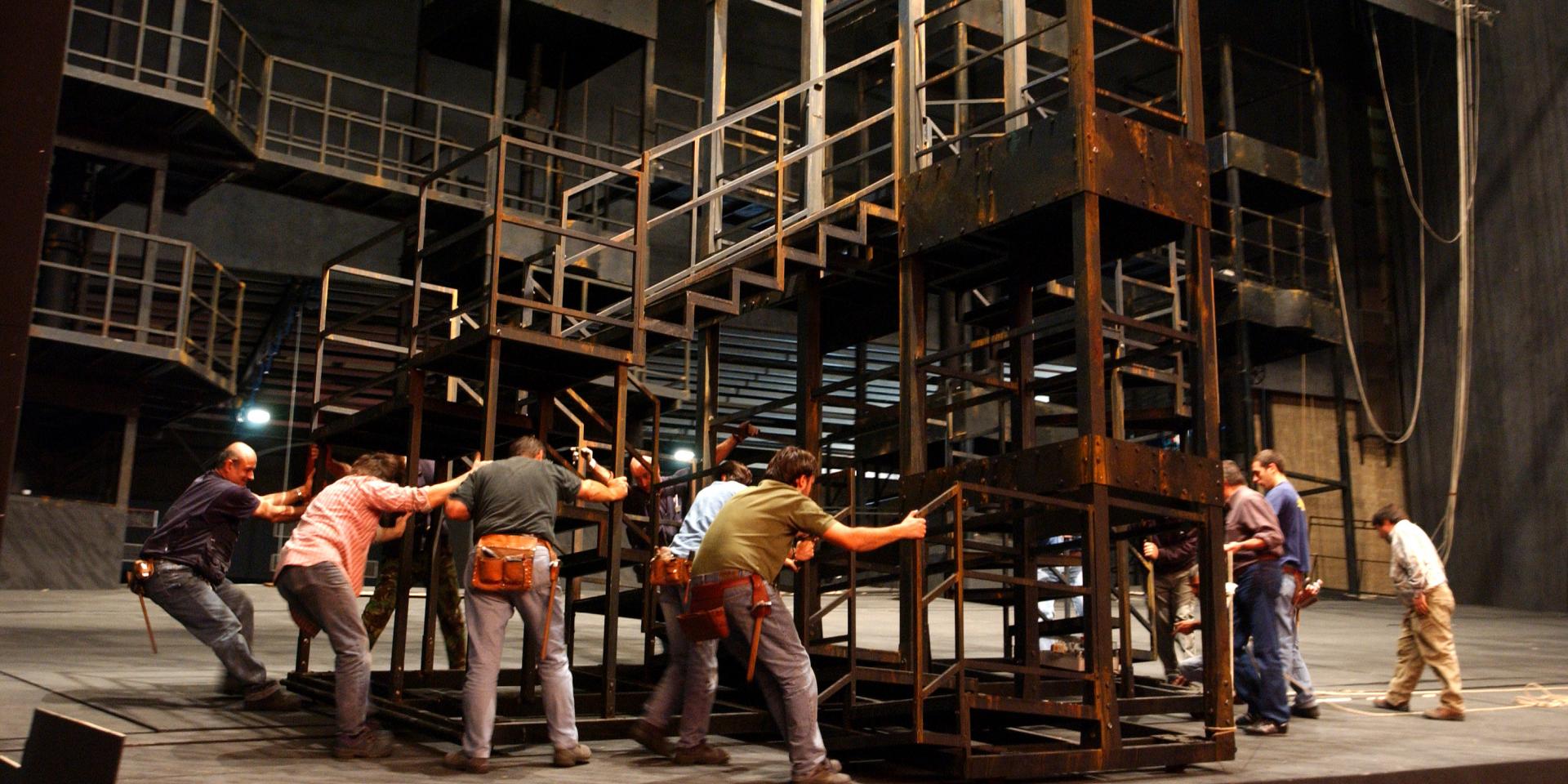 Stagehands at work on the Teatro Regio stage